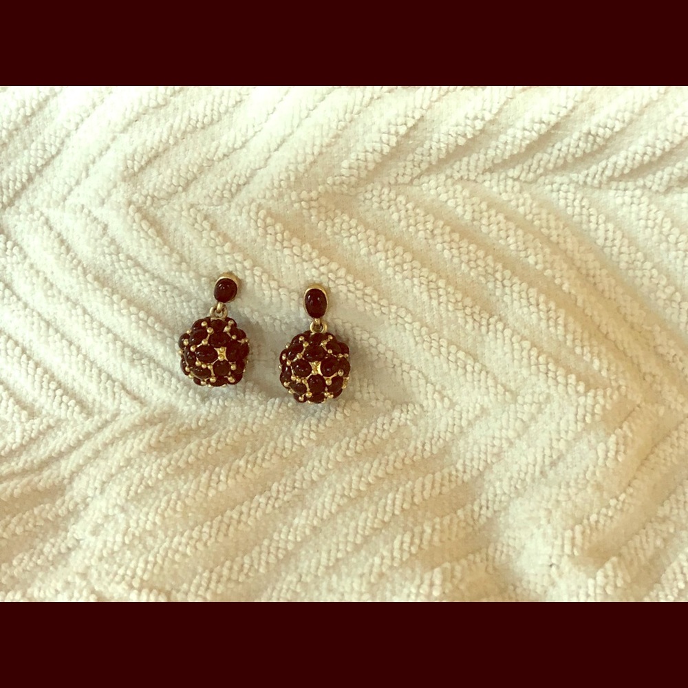 Gold tone and black earrings